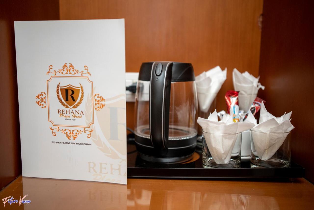 Rehana Plaza Hotel Kair Zewnętrze zdjęcie A tea and coffee making facility in a hotel room